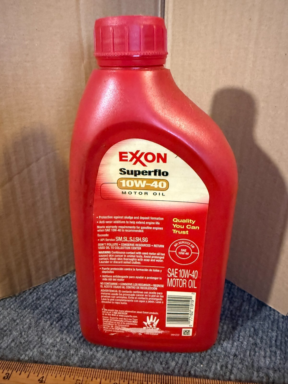 Exxon Superflo 10W-40 High Performance Motor Oil. 1 Quart. Red bottle